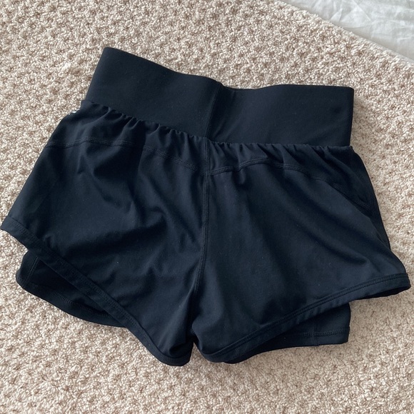 Fabletics Perforated Run Shorts - Picture 4 of 5